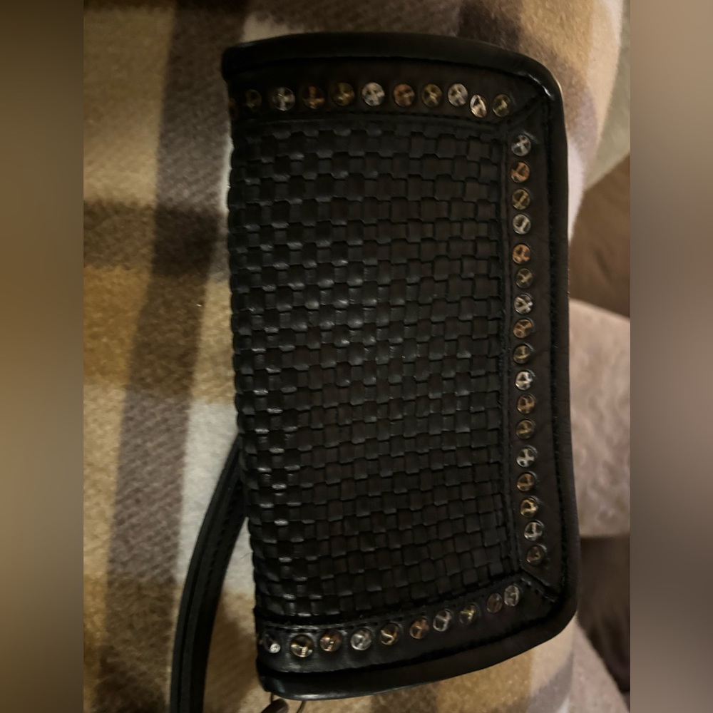 Black leather wristlet with hardware